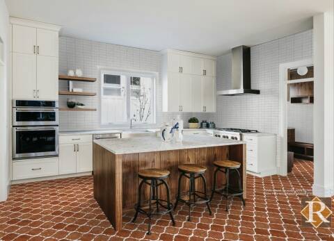 fleur de lis antique mexican saltillo tile flooring with glazed terracotta backsplash tiles